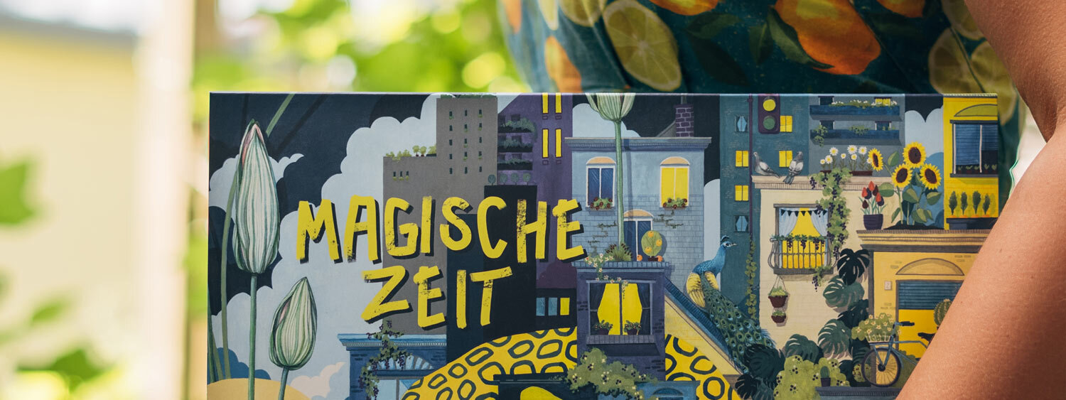 Schachtel des Bio-Saatgut-Adventskalenders „Magische Zeit“ Urbanes Gartenglück mit illustrierter Häuserfassade